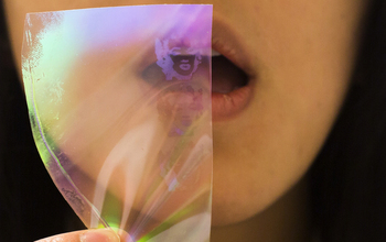 photo of person breathing against a piece of plastic